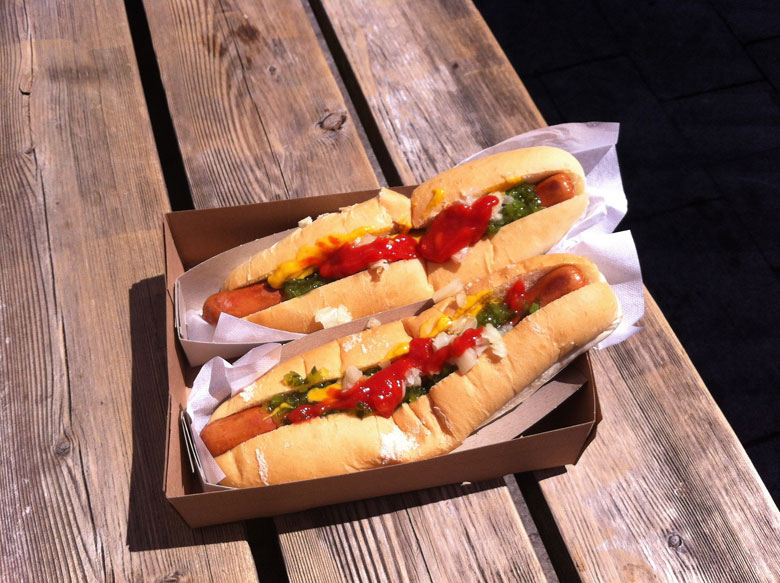 Hot Dogs on picnic table at The Arbor in Port Dover, Ontario