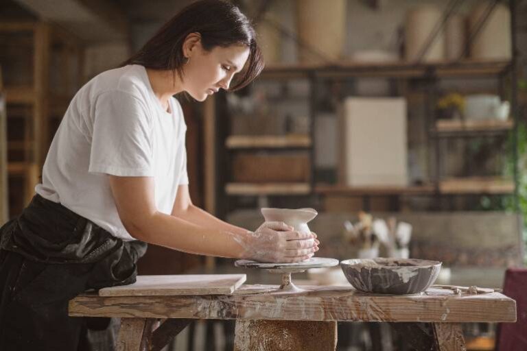 Tips for starting a new hobby that you can transform into a business - woman creating pottery.