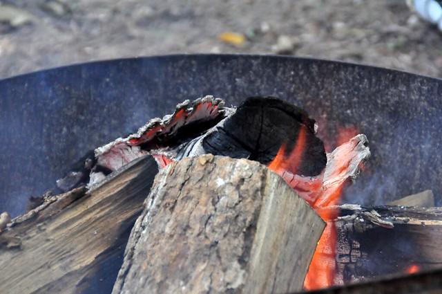 Why you should camp after Labour Day - wood fire in pit